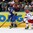 MINSK, BELARUS - MAY 24: Sweden's Linus Klasen #86 skates with the puck while Russia's Maxim Chudinov #73 chases him down during semifinal round action at the 2014 IIHF Ice Hockey World Championship. (Photo by Andre Ringuette/HHOF-IIHF Images)